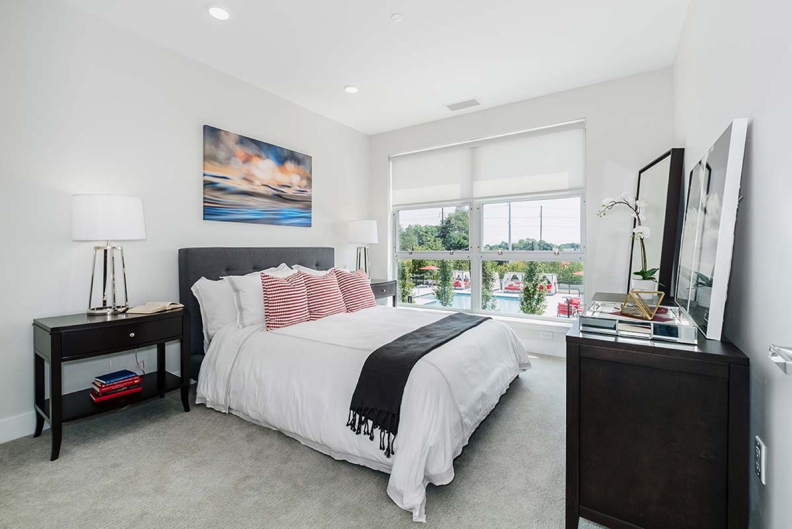 A Trademark Fairfield living room with extra-large windows and solar shades